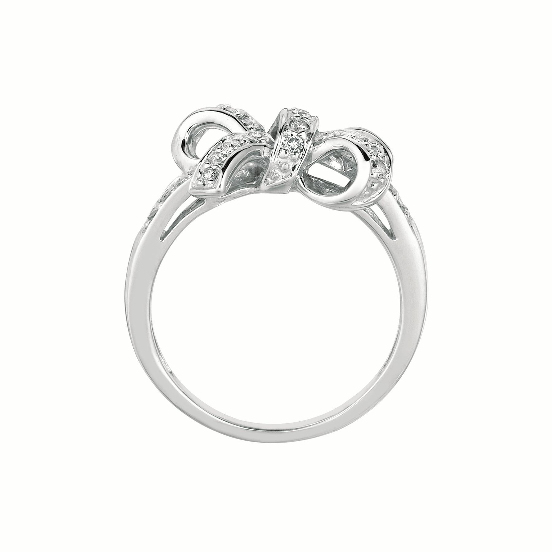 
0.25 Carat Natural Diamond Bow Ring G SI 14K White Gold

    100% Natural Diamonds, Not Enhanced in any way Round Cut Diamond Ring
    0.26CT
    Color G-H 
    Clarity SI  
    14K White Gold,  3.2 grams,   Pave set
    3/8 inch in width 
    Size