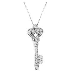 Collier pendentif clé en or blanc 14 carats avec chaîne et diamants naturels de 0,25 carat