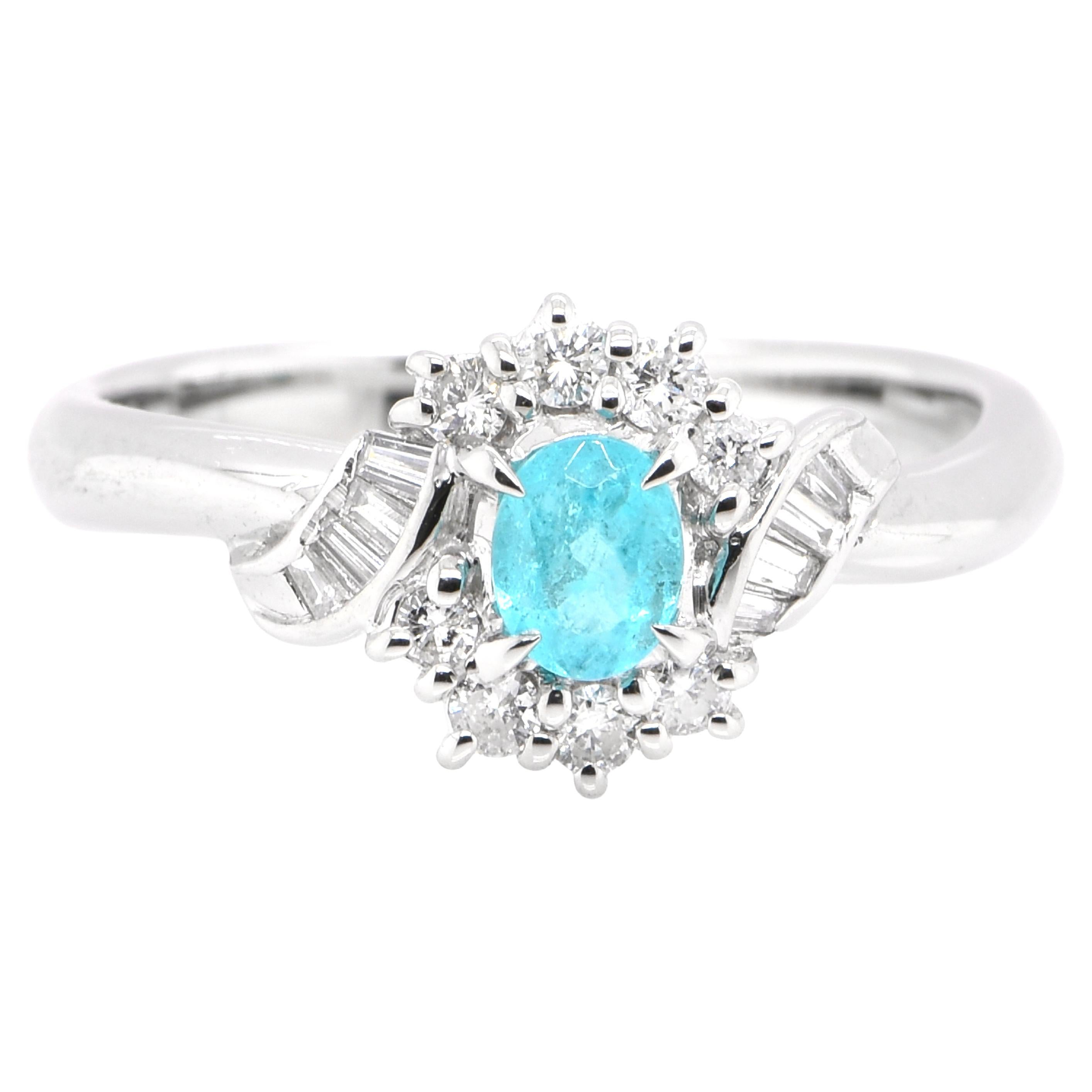 0.25 Carat Natural Paraiba Tourmaline and Diamond Ring Set in Platinum