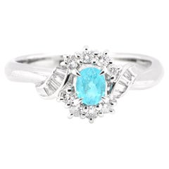 0.25 Carat Natural Paraiba Tourmaline and Diamond Ring Set in Platinum