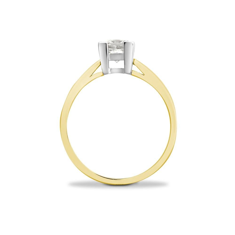 A modern classic engagement ring. Handmade in 18 Karat Gold, with a 0.25 Carat White Diamond. Set in an open gallery 4 corners mount with a split v-shank.  A very pretty 0.25 Carat Certificated Diamond G Color VS-SI1. The ring has a British