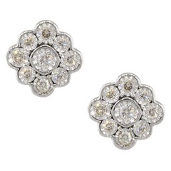 Clous d'oreilles à fleurs en or 14 carats avec diamants ronds de 0,25 carat
