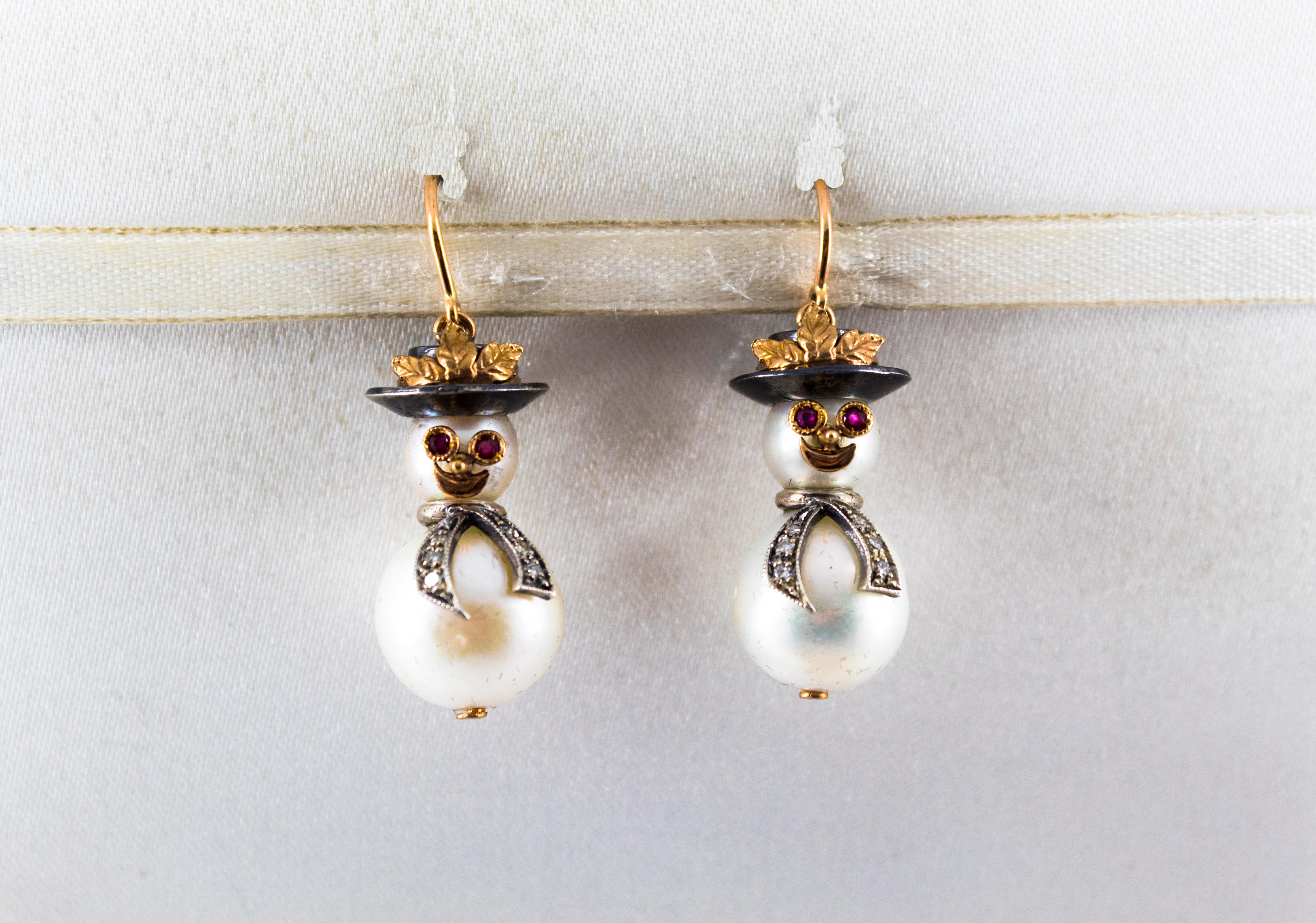 These Earrings are made of 9K Yellow Gold and Sterling Silver.
These Earrings have 0.15 Carats of White Modern Round Cut Diamonds.
These Earrings have 0.10 Carats of Rubies.
These Earrings have also two Indonesian Pearls and two Japanese