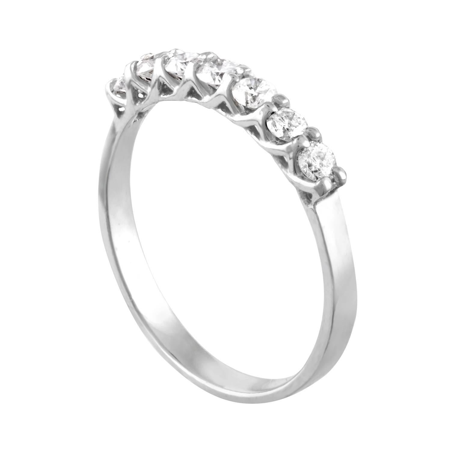 Delicate Seven-Stone Ring Great For Stacking
The ring is 14K White Gold
There are 0.25 Carats in Diamonds H I3
The ring is a size 5.5, sizable
The ring weighs 1.3 grams