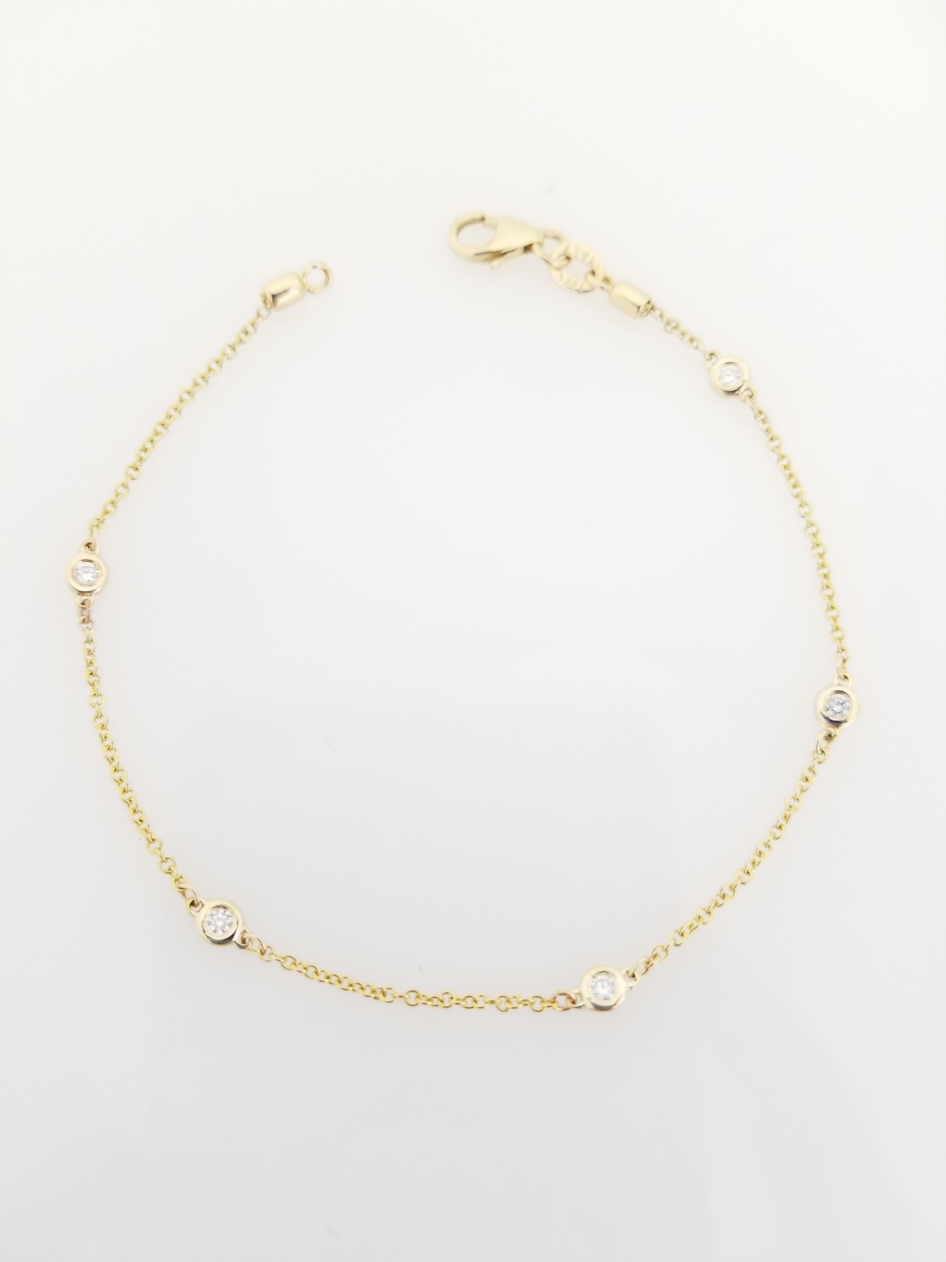 Beautiful Collection 5 Stations Diamond By The Yard Bracelet 14K Yellow Gold. 0.25 ctw. 7 Inch. 