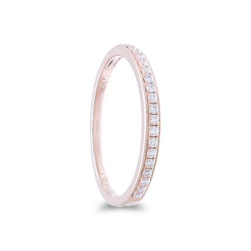 Diamonds: Nineteen meticulously selected excellent round diamonds grace this wedding ring, each set securely in a delicate micro pave setting, creating a continuous and delicate shimmer. The total carat weight of 0.25 carats ensures a captivating