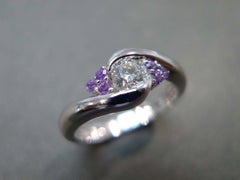0.25ct Diamond and Amethyst Engagement Twist Tension Ring in 18K White Gold
