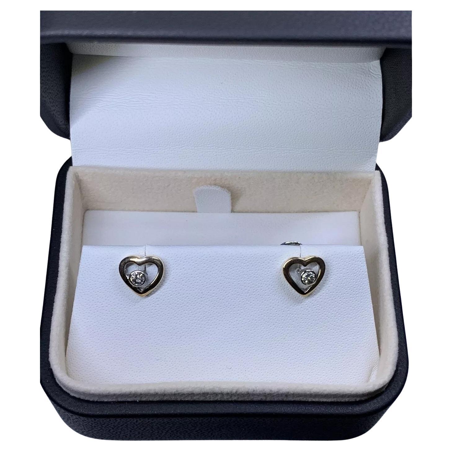 Pendientes de oro amarillo de 18 ct con solitario de diamante de 0,25 ct