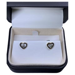 Pendientes de oro amarillo de 18 ct con solitario de diamante de 0,25 ct