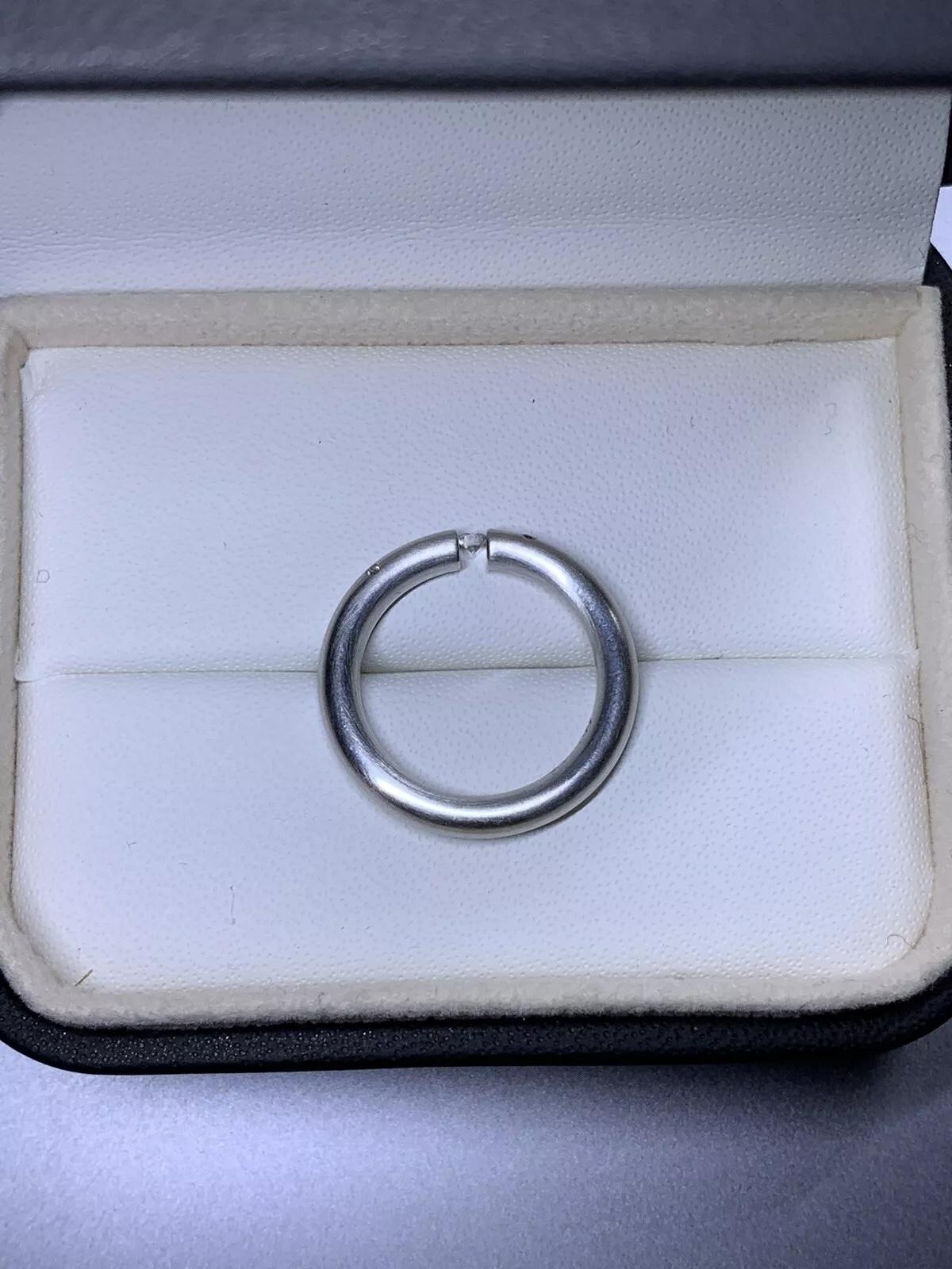 Women's or Men's 0.25ct Floating diamond chunky solitaire engagement ring 18ct white gold For Sale