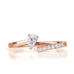 0.25ct Pear Shaped and Round Brilliant Cut Asymmetric Diamond Band