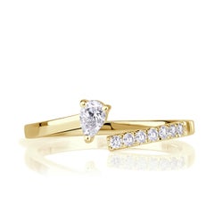 0.25ct Pear Shaped and Round Brilliant Cut Asymmetric Diamond Band
