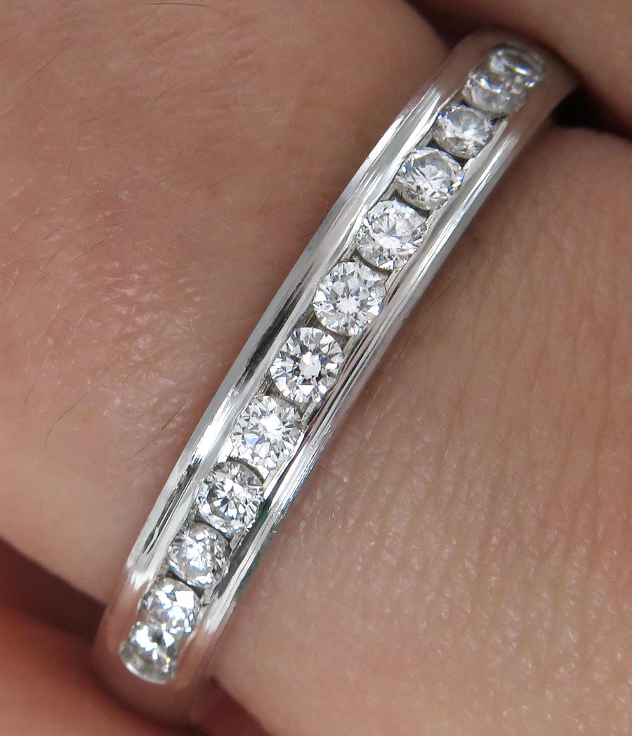 GORGEOUS Round diamond Ring from our EXQUISITE WEDDING BAND design collection!
Made by Benchmark rings in USA.
Beautiful to wear alone or with your engagement ring. Perfectly stackable with any many other style bands.

There are 12 Round Brilliant