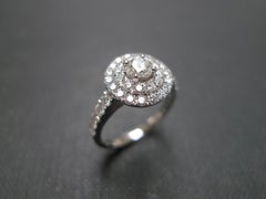 0.25ct Round Brilliant Cut Diamond Double Halo Engagement Ring in 18K White Gold