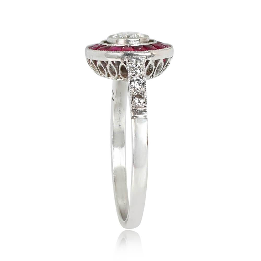 Diamond & Ruby Halo Ring: This captivating ring showcases a central round brilliant cut diamond weighing around 0.25 carats, accented by a vibrant halo of French-cut natural rubies totaling about 0.51 carats. Additional round brilliant cut diamonds