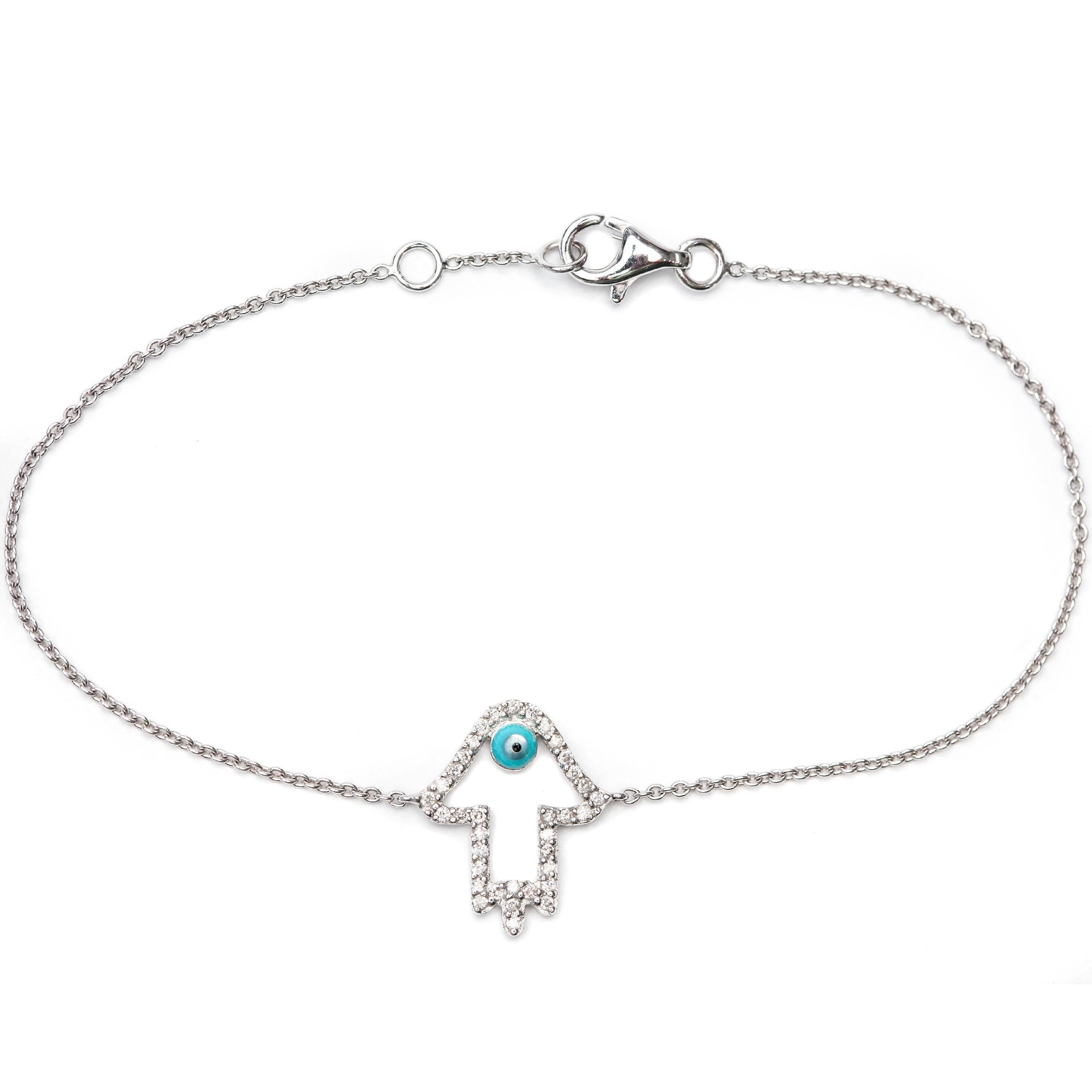 This luxurious Diamond Khamsa bracelet shimmers stunningly when it catches the light, featuring 0.25ct Round Brilliant H-SI1 Diamonds, this bracelet represents the ancient universal symbol of the evil eye, said to protect the wearer from any evil