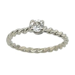 0.25 Karat Solitär Diamant Ring mit gedrehtem Muster aus 9 Karat Weißgold