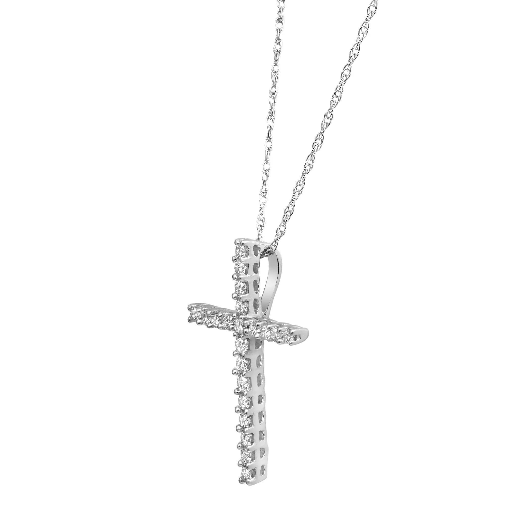 This gorgeous diamond cross pendant is encrusted with 22 round brilliant cut diamonds weighing 0.25 carat. The Diamonds are very sparkly and of high quality beautifully set in a prong setting. Diamond color H-I Color and VS-SI Clarity. Crafted in