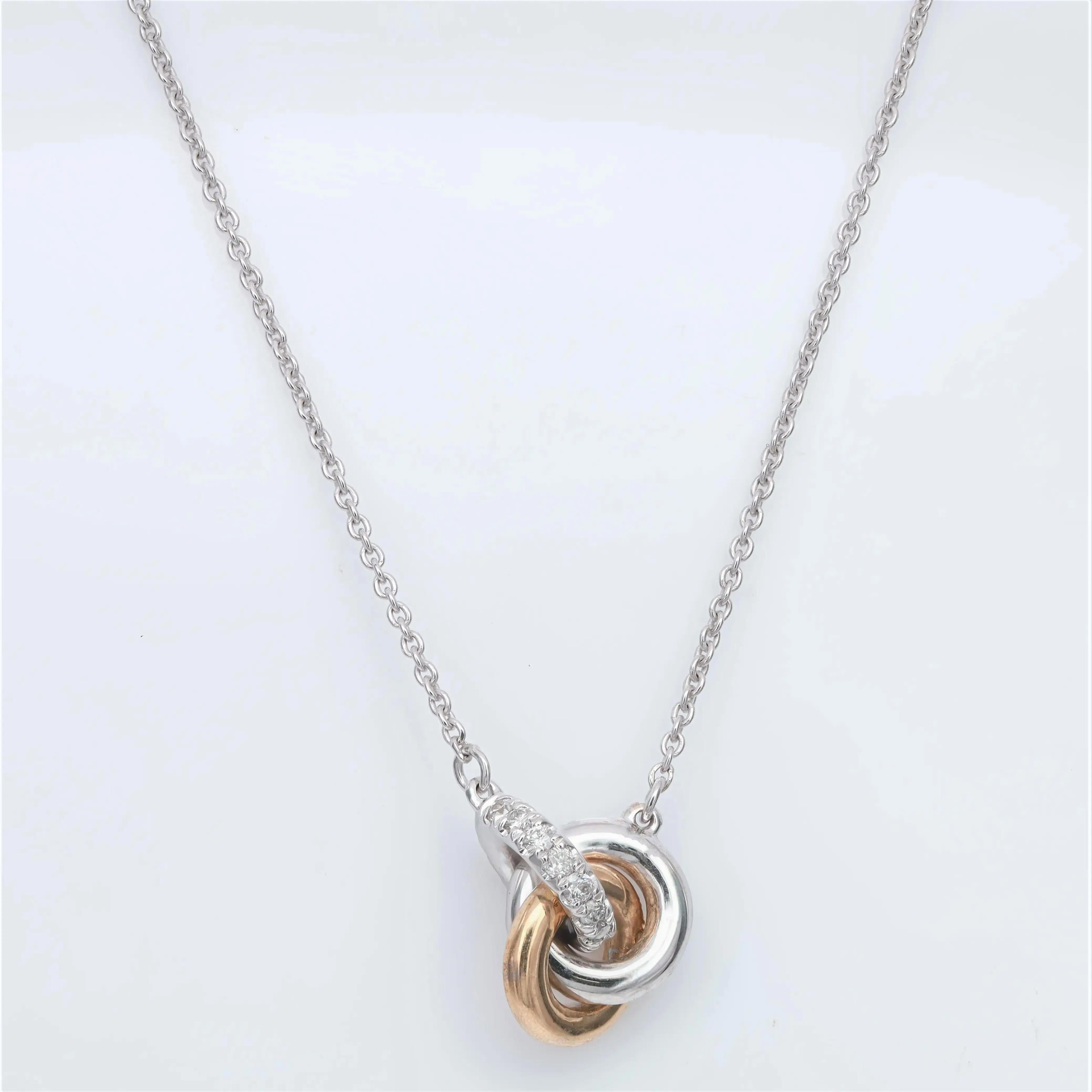 Modern 0.25cttw Round Cut Diamond Two Tone Pendant Necklace 10k White & Yellow Gold For Sale