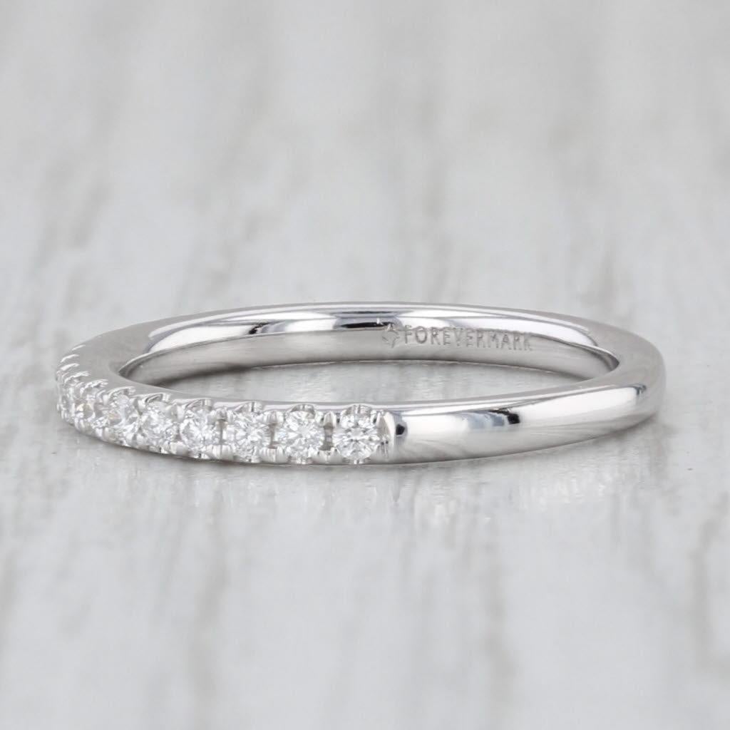 Información sobre la gema:
- Diamantes naturales -
Quilates totales - 0,25ctw
Talla - Redonda brillante
Color - H - I
Claridad - VS2 - SI1

Metal: Oro blanco de 14 quilates
Peso: 1.6 gramos 
Sellos: 14k Forever Mark
Altura de la cara: 2 mm 
Altura