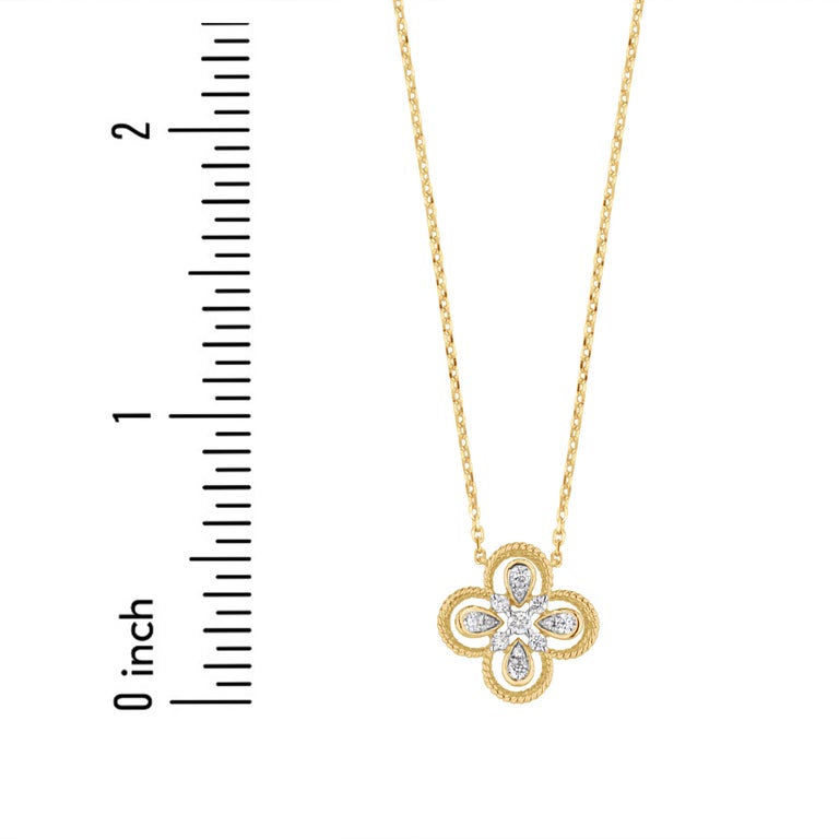 This beautiful pendant is a beautiful clover flower pattern, featuring carefully set round diamonds. The total diamond weight is 0.26 carats. The outside of the clover is a delicately twisted rope design. Set in 14k Yellow Gold, with an attached