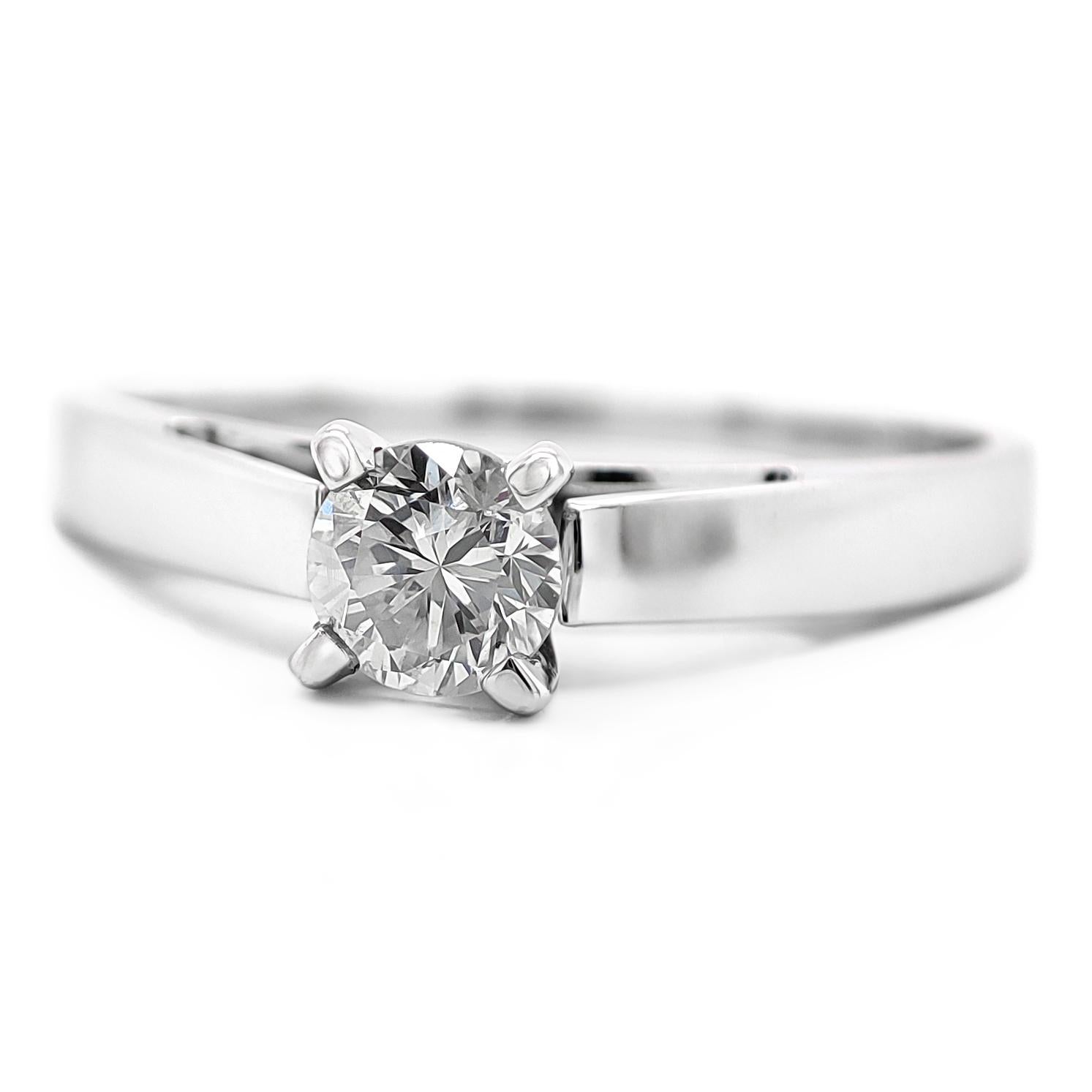 FOR US BUYER NO VAT

This engagement ring is a symbol of love and commitment. The stunning 0.26 carat round diamond takes center stage, capturing the essence of your special bond with its exquisite brilliance.

The ring is crafted in 14K white gold,