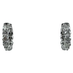 Boucles d'oreilles Huggie en or blanc 14 carats et diamant de 0,26 carat