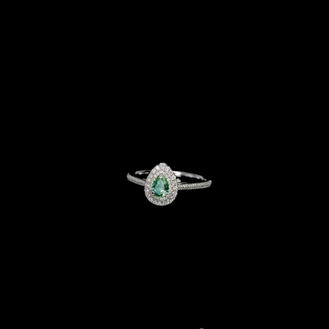 **100% NATURAL FANCY COLOUR DIAMOND JEWELRY**

✪ Jewelry Details ✪

♦ MAIN STONE DETAILS

➛ Stone Shape: Pear
➛ Stone Color: Fancy Green
➛ Stone Clarity: VS
➛ Stone Weight: 0.26 carats
➛ AGL certified

♦ SIDE STONE DETAILS

➛ Side white diamonds -
