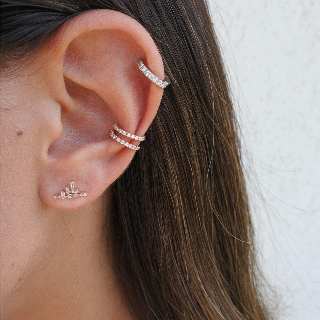 0.26 Carat Geometrical Diamond Earrings in 18K Rose Gold - Shlomit Rogel

Art deco coolness to add to your ear party. Handcrafted from 18k rose gold, these stylish studs feature a stack of 7 genuine baguette cut diamonds for a playful geometric