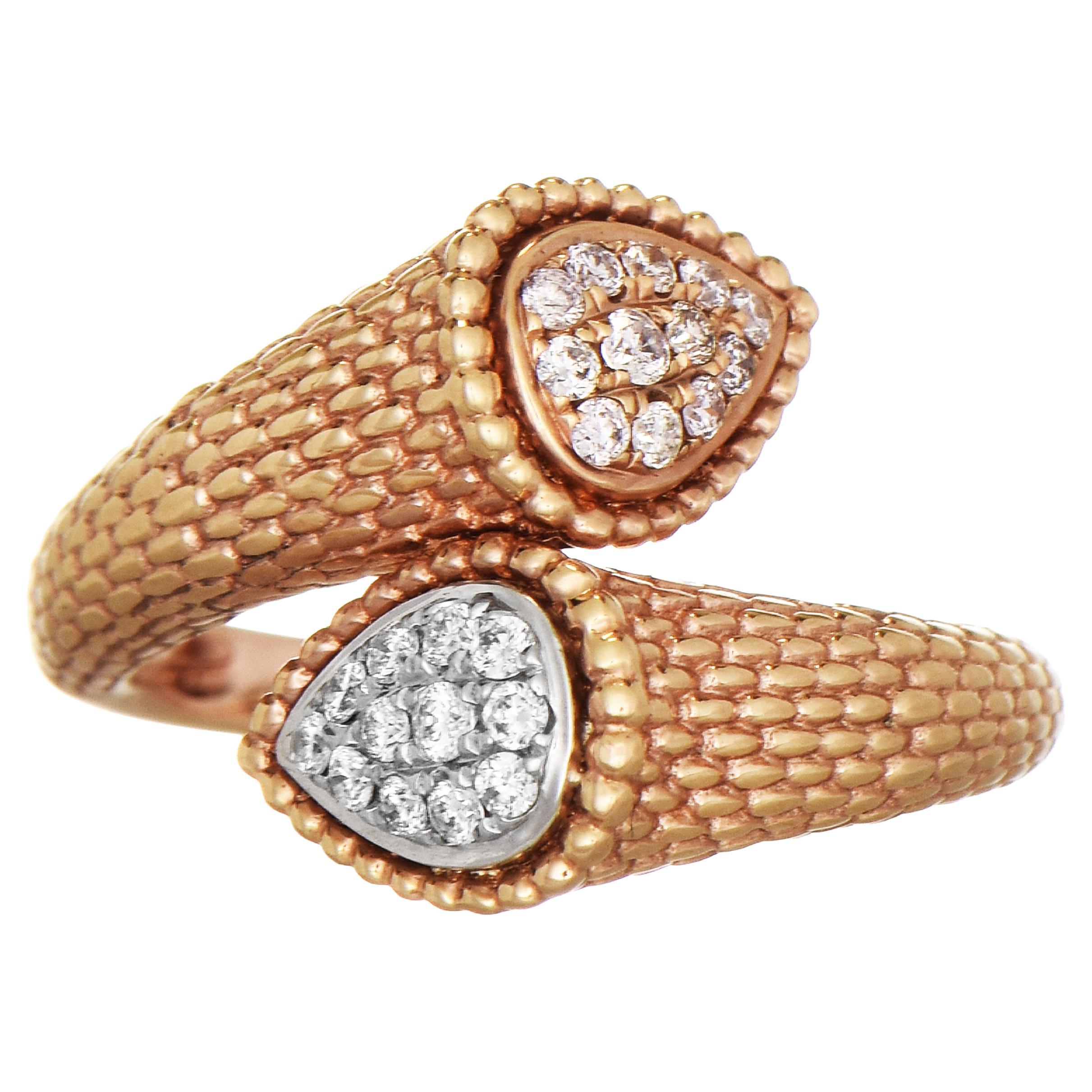 Anillo de oro rosa con diamantes rosas y blancos de 0,26 quilates