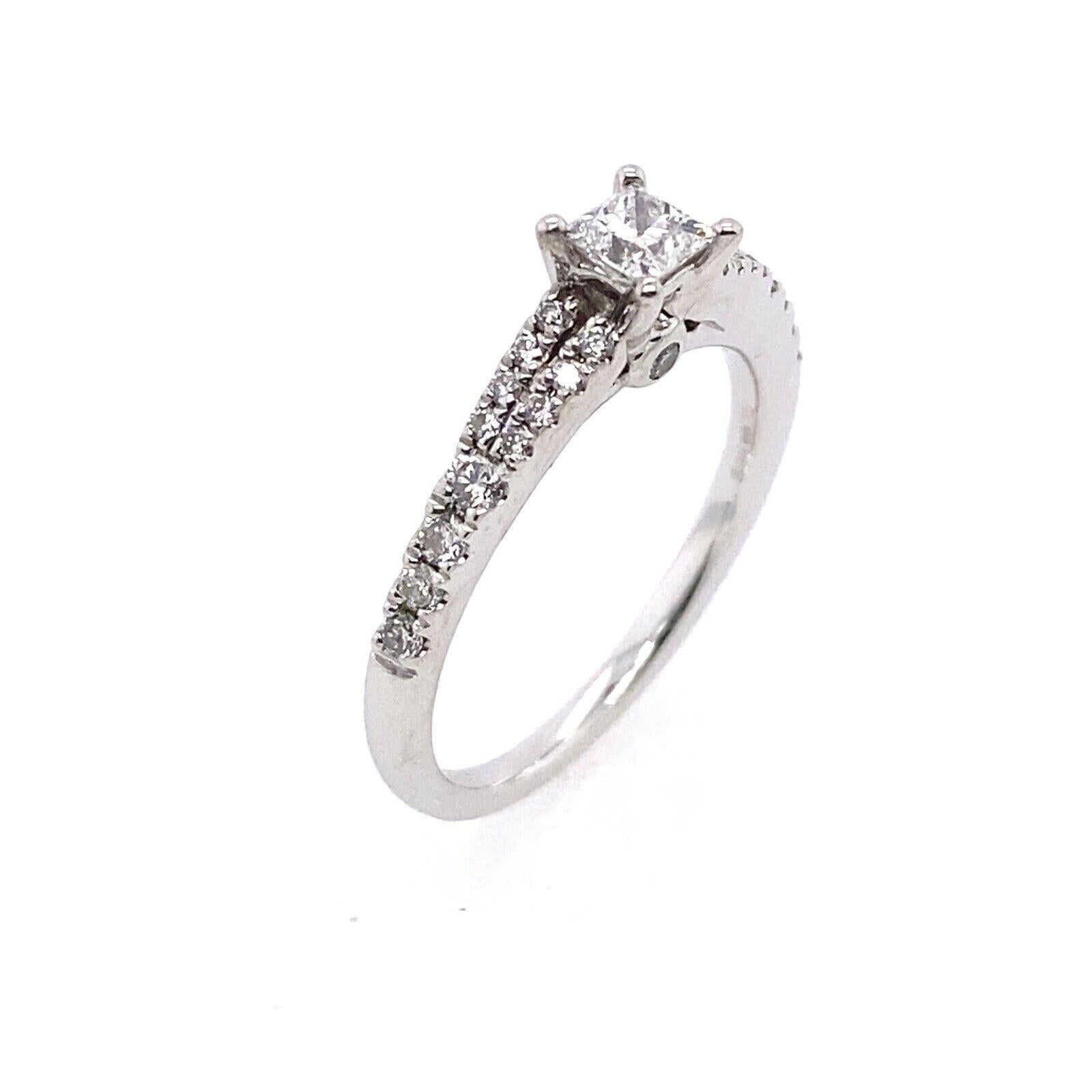 Tolkowsky Princess Cut 0.26ct Diamond Set In 18ct White Gold

This simple and elegant ring set with 0.26ct princess diamond with 13 round diamonds on each shoulder set in 18ct white gold, with split shank Tolkowsky Box

Additional Information: