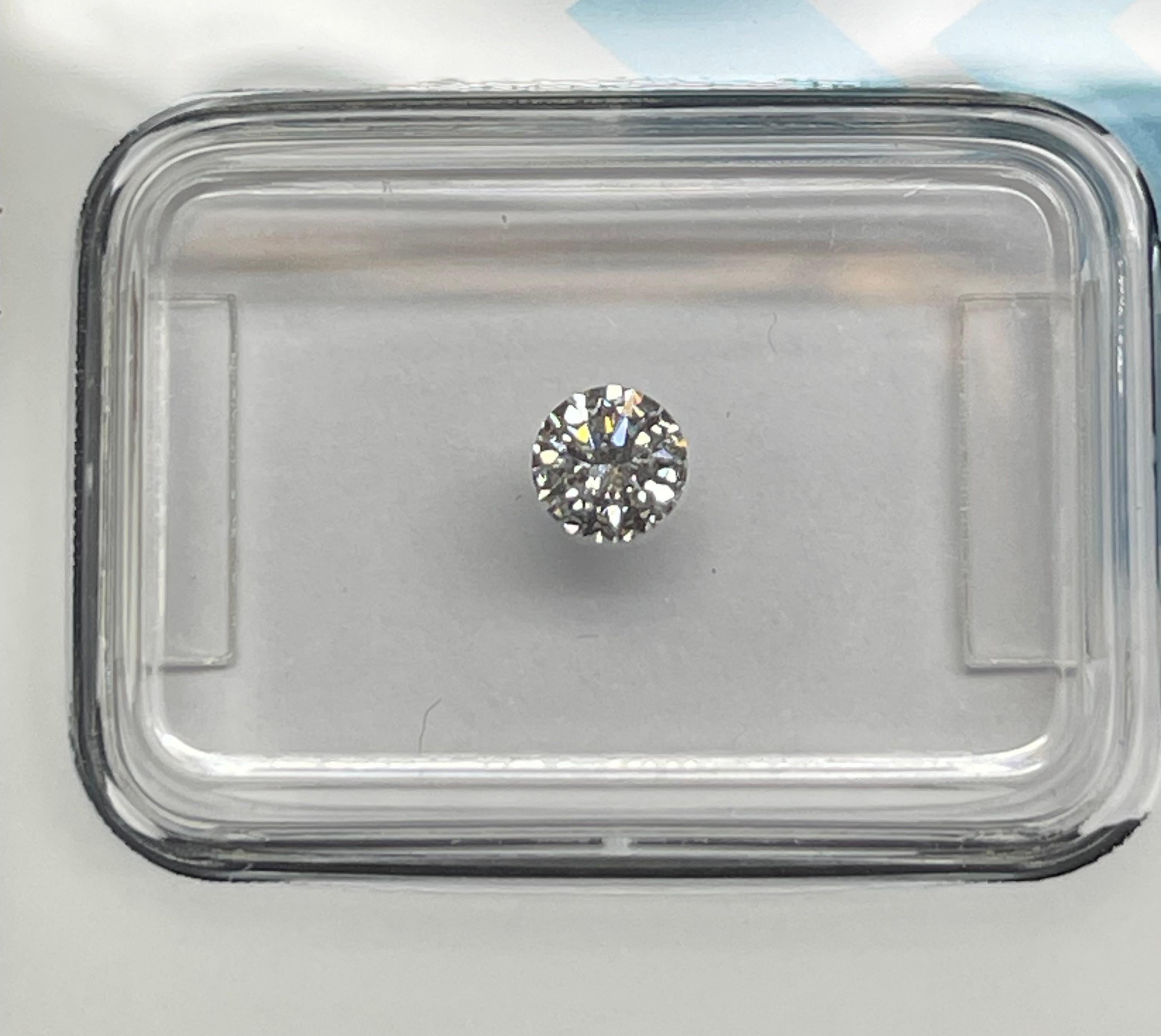 Natural Diamond graded by IGI.

Shape: Round Brilliant
Weight: 0.26 CT
Color: D
Clarity: VS2
Cut: Excellent
Polish: Excellent
Symmetry: Excellent
Fluorescence: None
Laser inscription : IGI 630434193