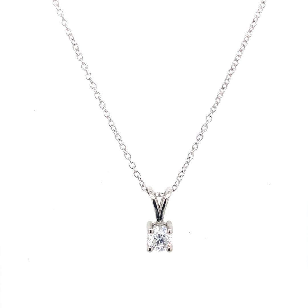 18ct White Gold Round Brilliant Cut Diamond Pendant With Chain.

Additional Information:
Total Diamond Weight: 0.26ct
Diamond Colour: G/H
Diamond Clarity: SI
Total Weight: 2g 
Chain Length: 16-18