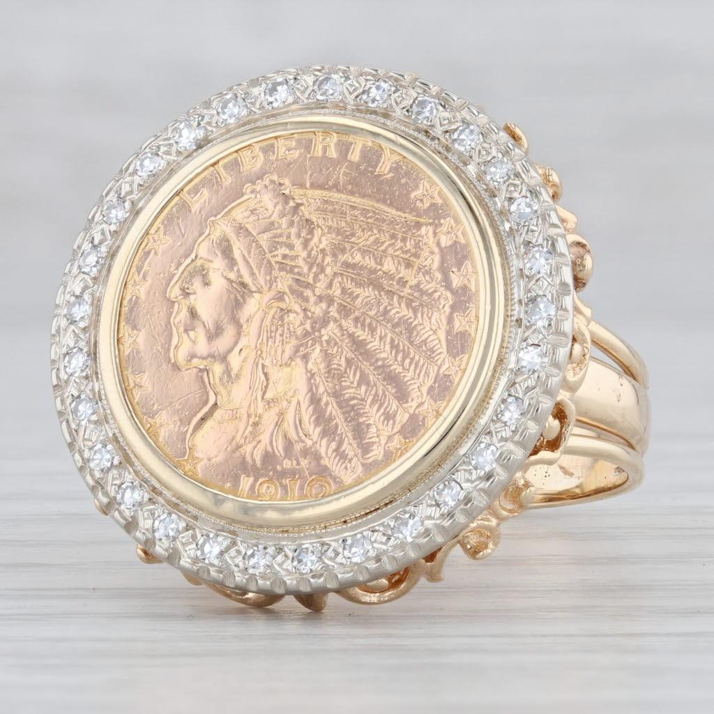 Gemstone Information:
- Natural Diamonds -
Total Carats - 0.26ctw
Cut - Single
Color - H - I
Clarity - VS2

Metal: 14k Yellow Gold Ring, 14k White Gold Halo, 900 Gold Coin 
Weight: 16.1 Grams 
Stamps: 14k
Face Height: 24.5 mm 
Rise Above Finger: 8.5