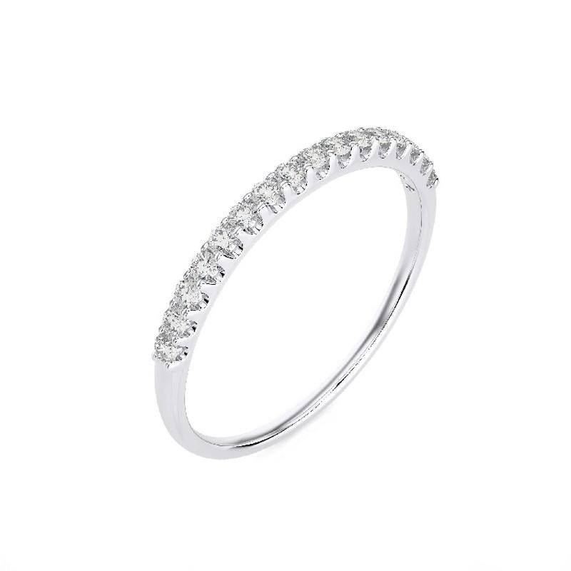 Diamonds: Sixteen meticulously selected round diamonds grace this wedding ring, each set in a T.C. (Tiny Channel) micro setting, creating a stunning, continuous shimmer. The total carat weight of 0.27 carats ensures a captivating and charming