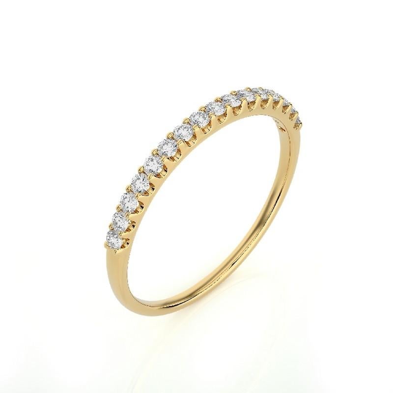 Diamonds: Sixteen meticulously selected round diamonds grace this wedding ring, each set in a T.C. (Tiny Channel) micro setting, creating a stunning, continuous shimmer. The total carat weight of 0.27 carats ensures a captivating and charming