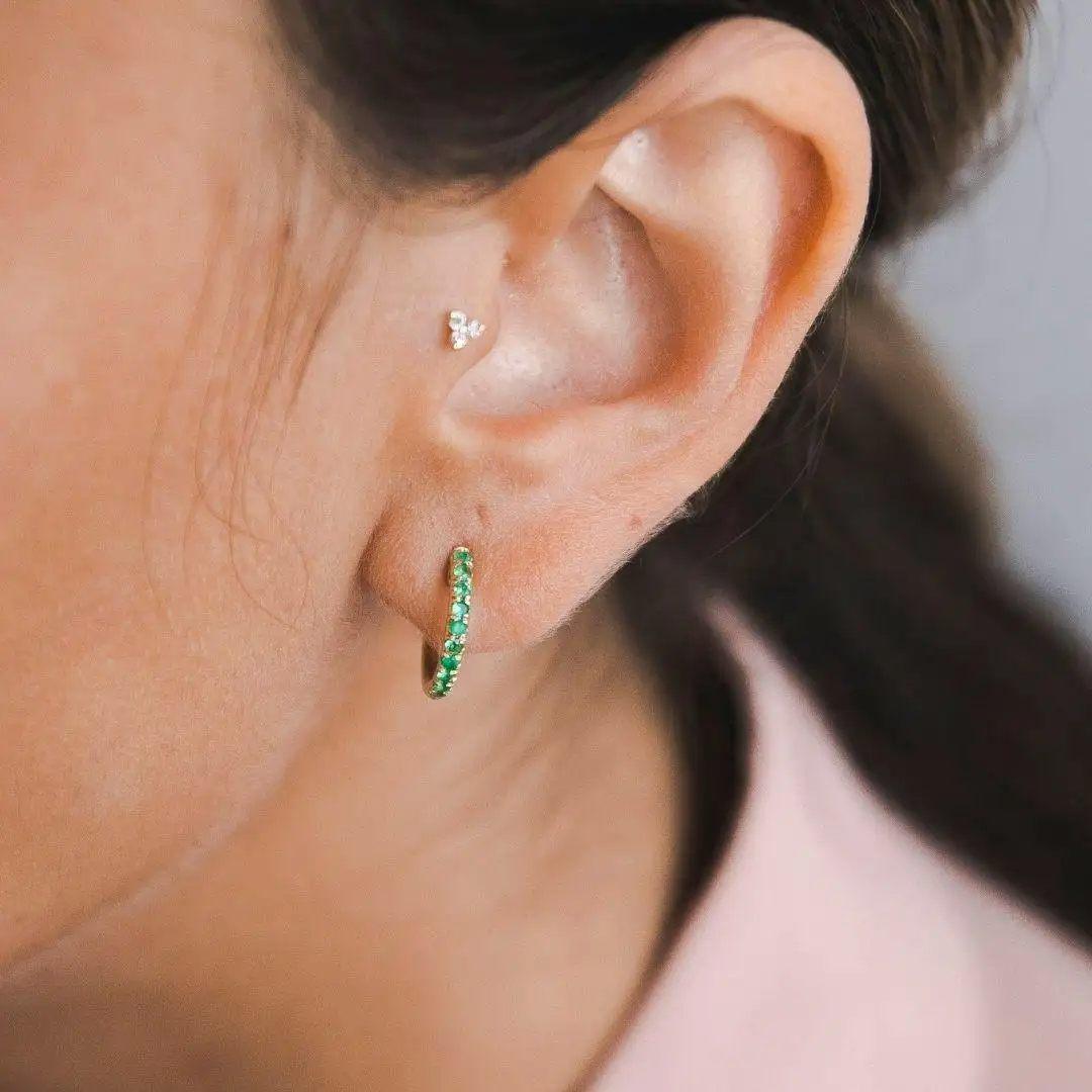 0.27 Carat Emerald Birthstone Hoop Earrings in 14 Karat Yellow Gold - Shlomit Rogel

Looking for a timeless pair of hoops to wear with any attire? Adorn your ears with the Lori diamond hoops for some extra shine. Handcrafted from 14k gold with a row