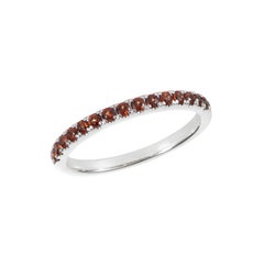 Sunita Nahata Garnet 0.27ct. Eternity Ring in 14 Karat White Gold.