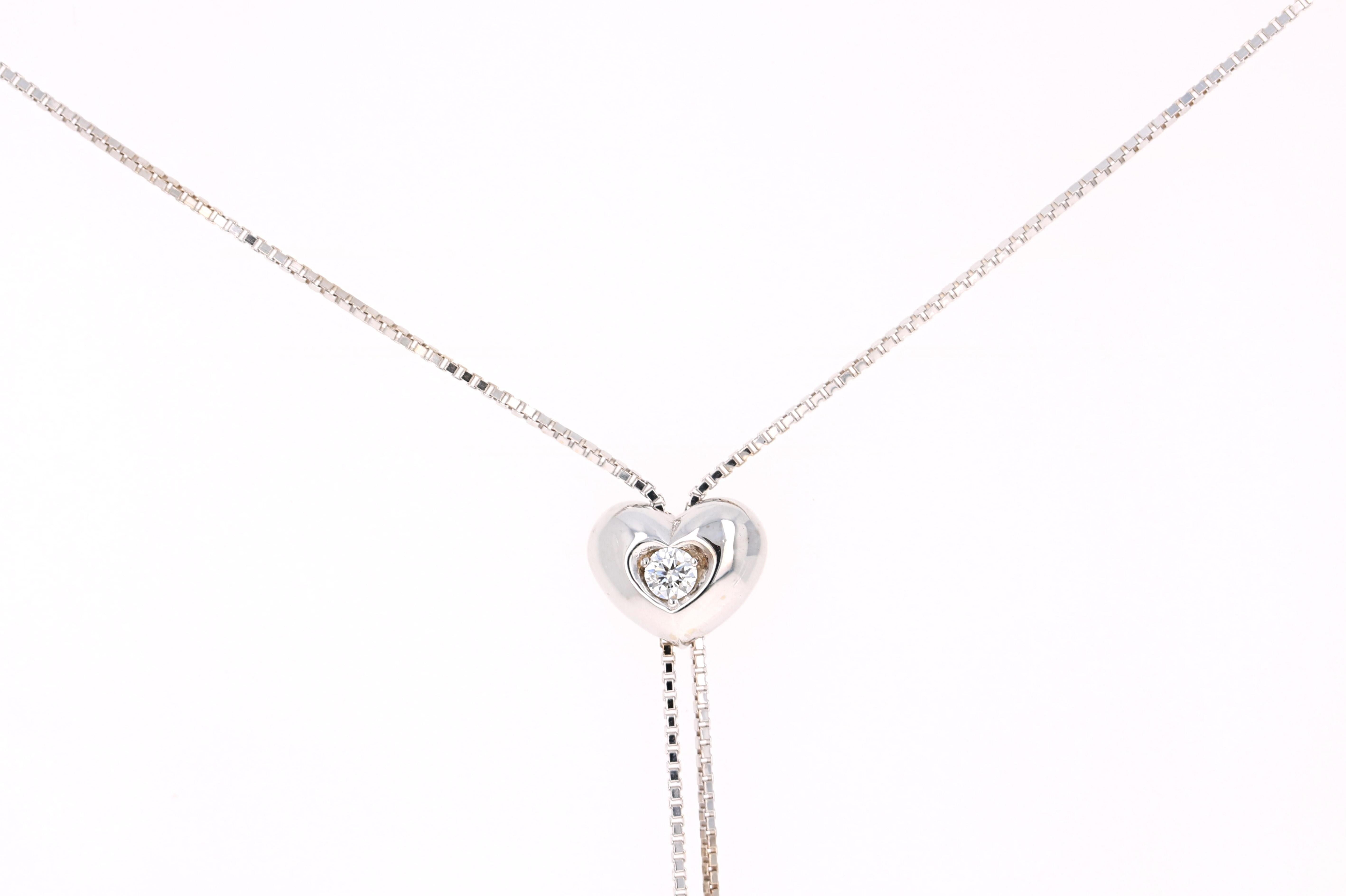 Beautiful Heart Shaped Necklace that can be adjusted to make shorter or longer. 

It has 7 Round Cut Diamonds that weigh 0.27 Carats.  (Clarity: VS, Color: H)

It is beautifully set in 14 Karat White Gold and weighs 6.4 grams.



