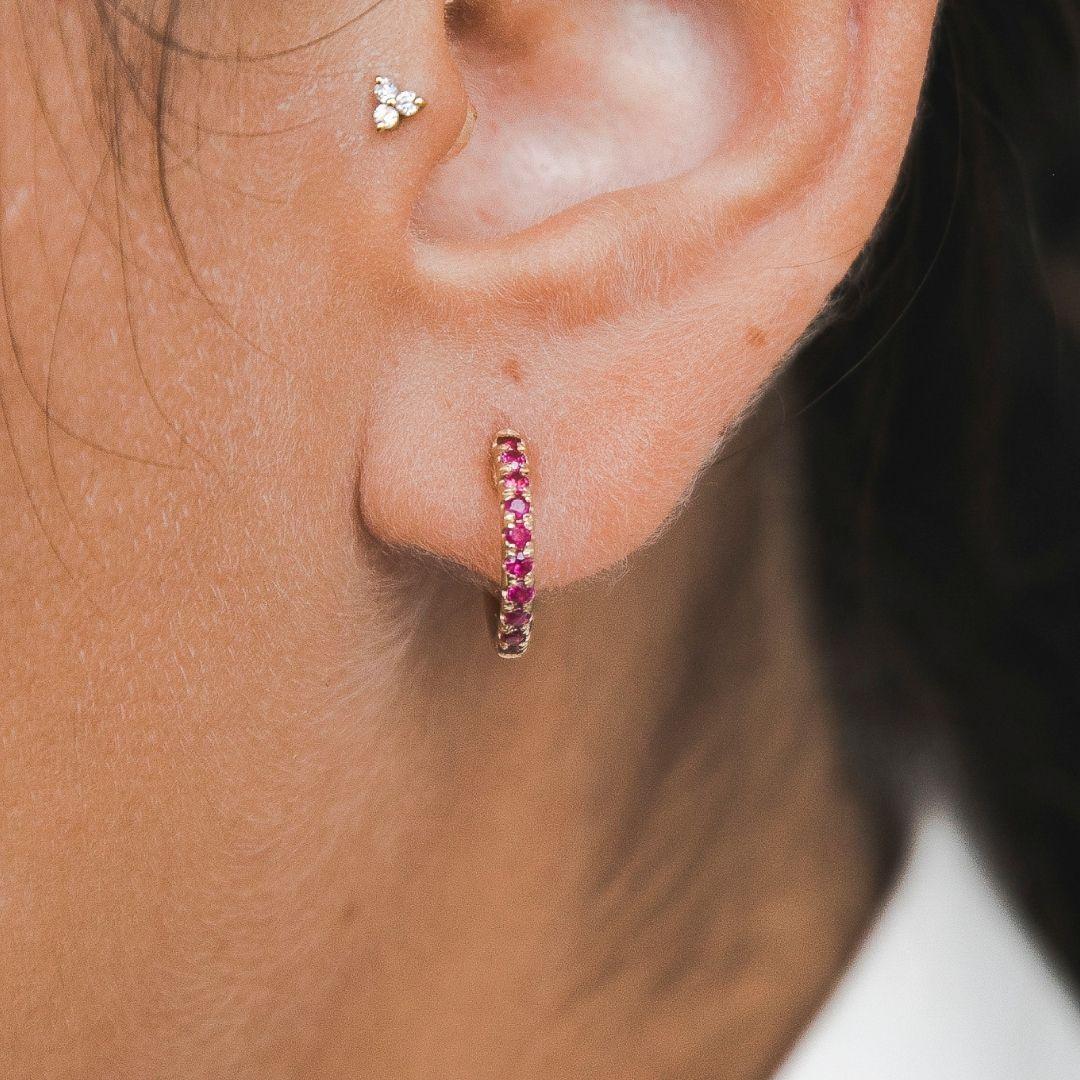 0.27 Carat Ruby Birthstone Hoop Earrings in 14 Karat Yellow Gold - Shlomit Rogel

Looking for a timeless pair of hoops to wear with any attire? Adorn your ears with the Lori ruby hoops for some extra shine. Handcrafted from 14k gold with a row of