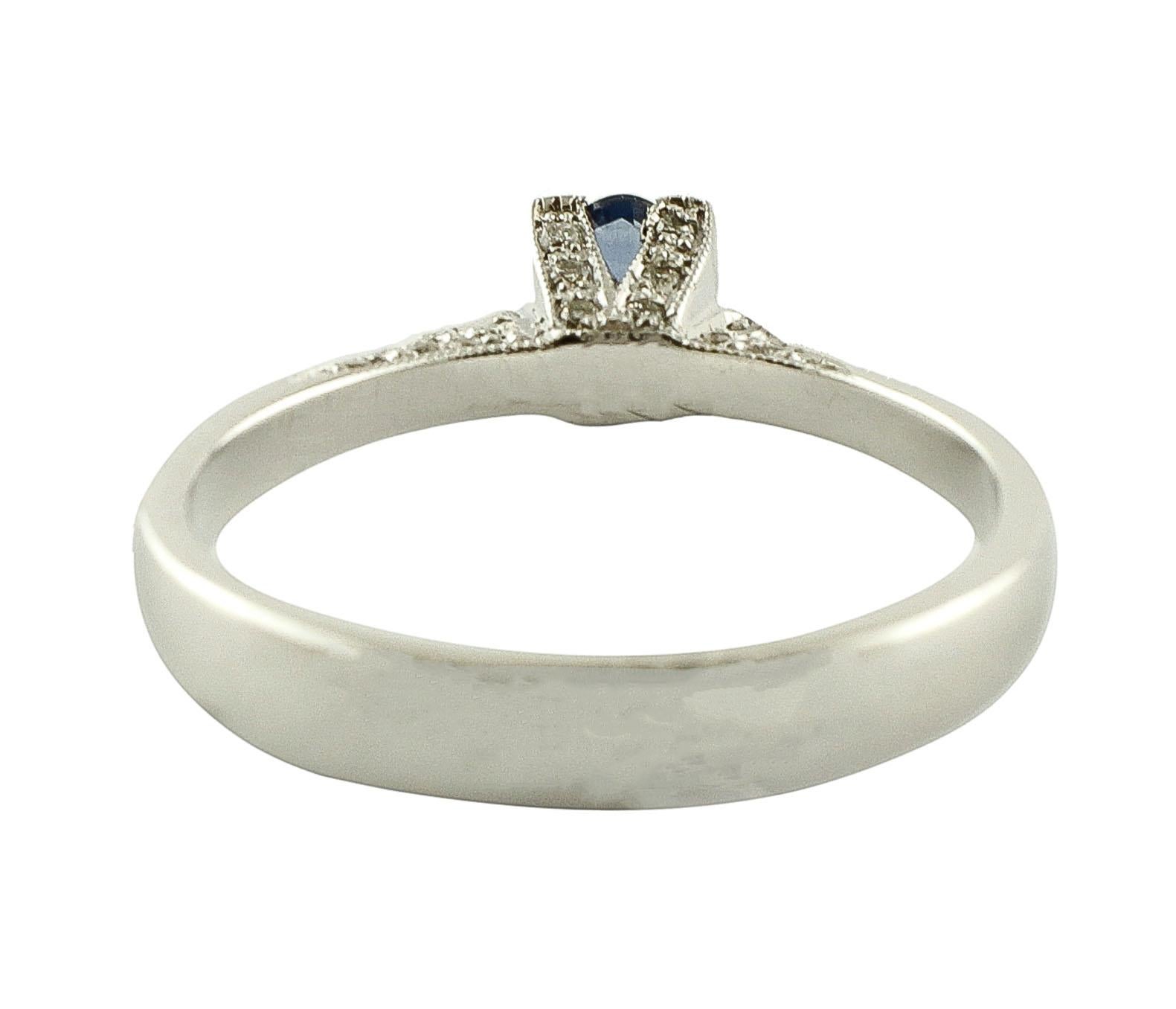 Modern 0.27 ct Blue Sapphire, 0.23 ct White Diamonds, 18K White Gold Solitaire Ring 