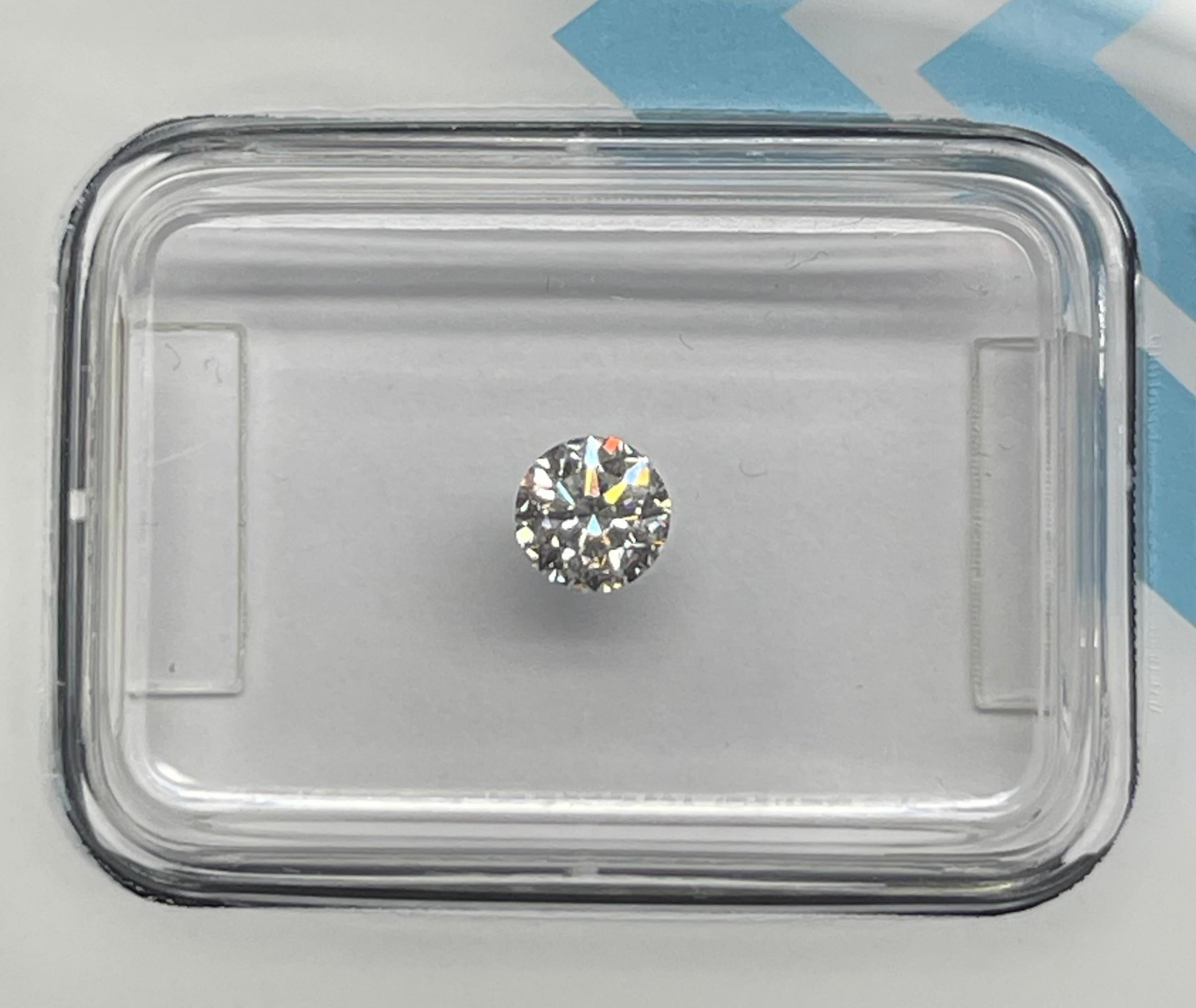 Natural Diamond graded by IGI.

Shape: Round Brilliant
Weight: 0.27 CT
Color: D
Clarity: SI2
Cut: Excellent
Polish: Excellent
Symmetry: Excellent
Fluorescence: None
Laser inscription : IGI 630434194