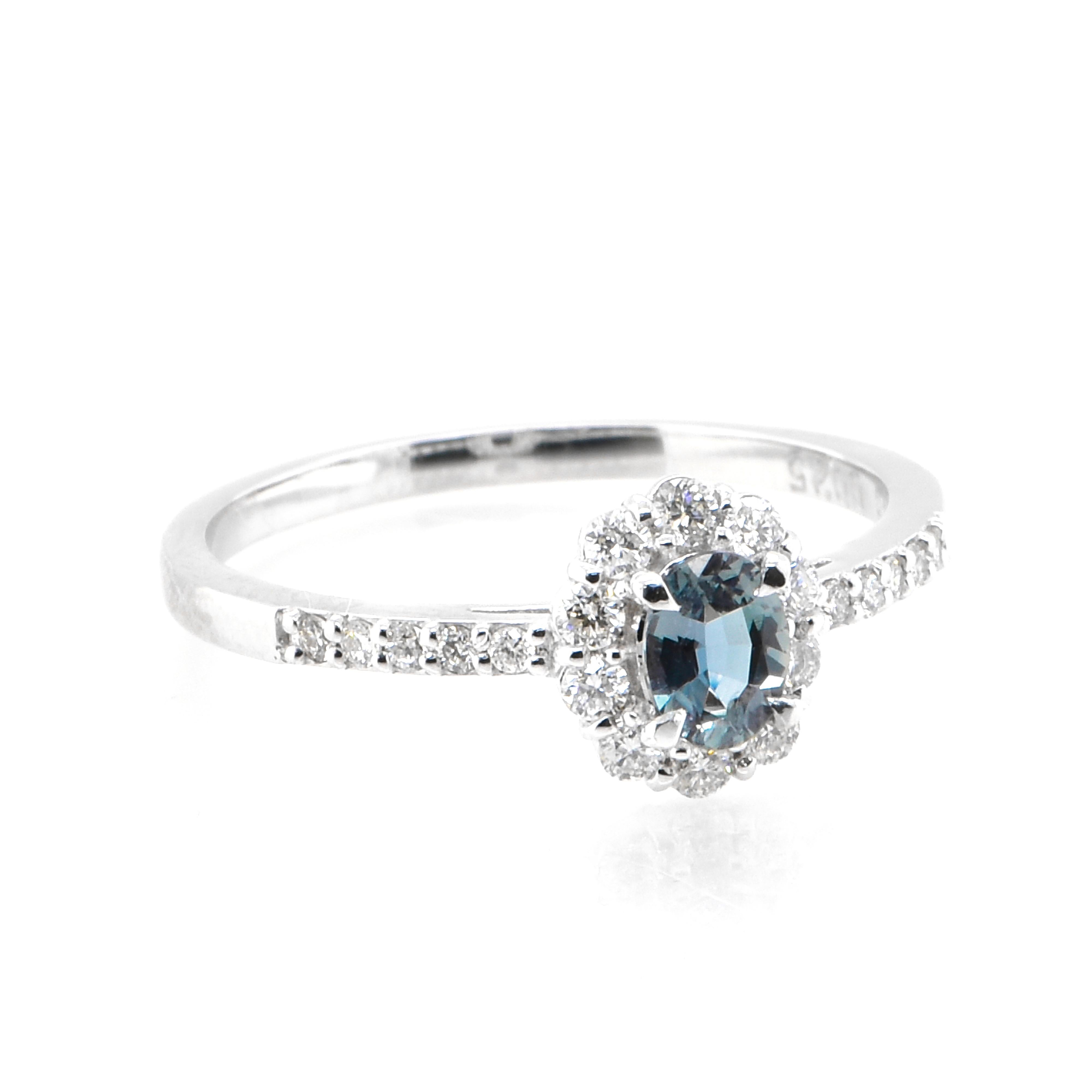 Modern 0.28 Carat Color-Changing, Brazilia Alexandrite and Diamond Ring set in Platinum For Sale