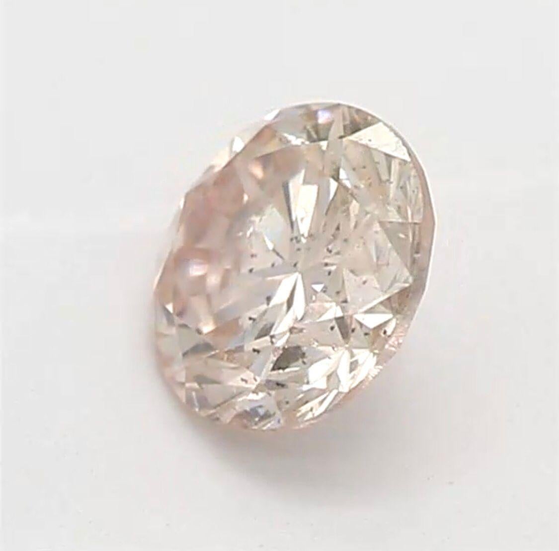 Women's or Men's 0.28 Carat Light Orangy Pink Round Shaped Diamond SI2 Clarity CGL Certified For Sale