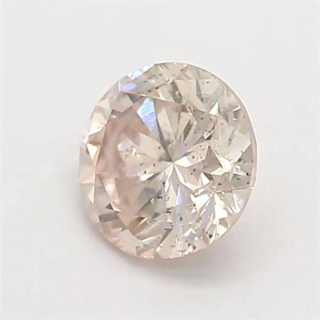 0.28 Carat Light Orangy Pink Round Shaped Diamond SI2 Clarity CGL Certified For Sale 1