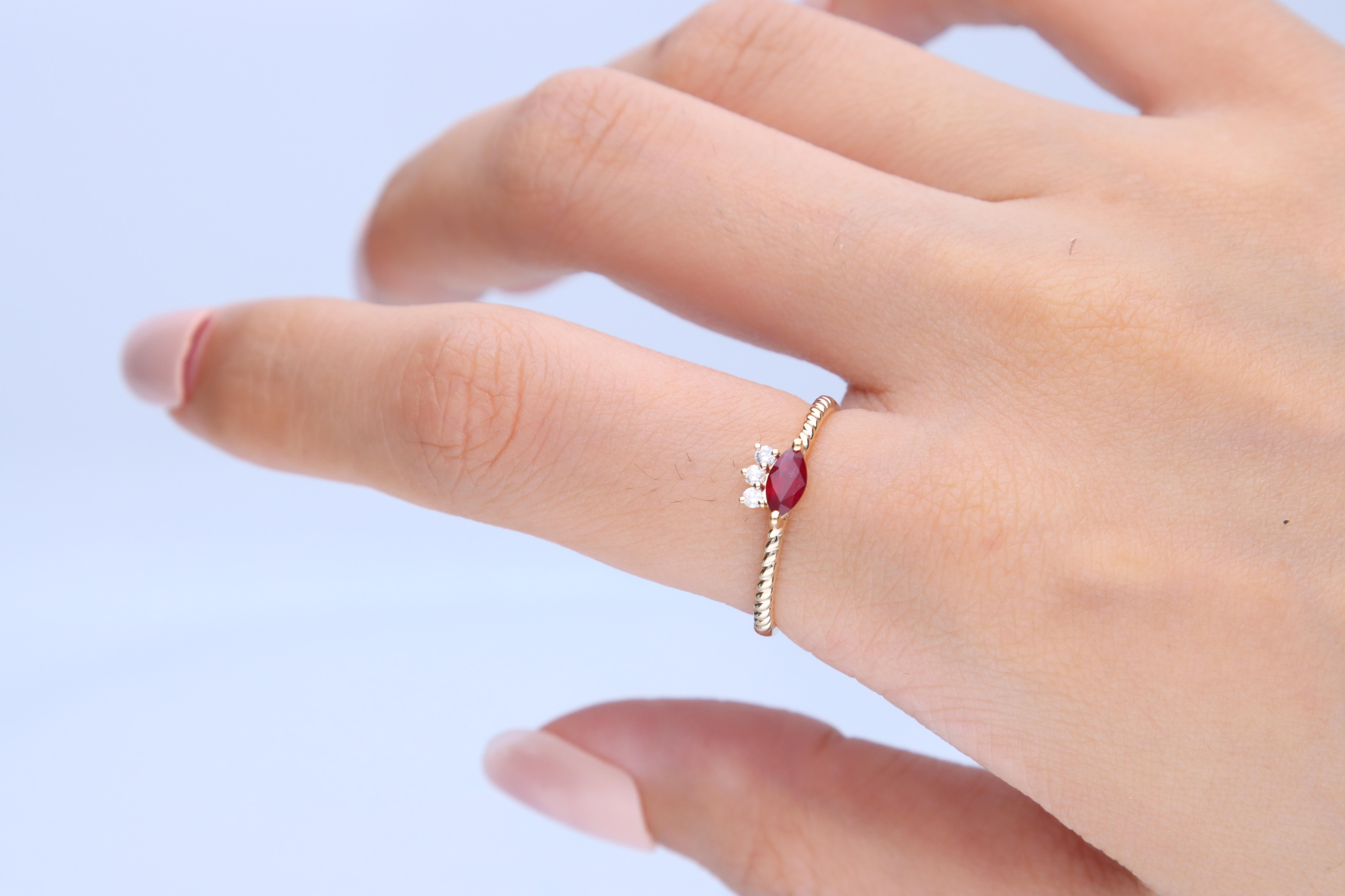 Stunning, timeless and classy eternity Unique ring. Decorate yourself in luxury with this Gin & Grace ring. The 14k Yellow Gold jewelry boasts 6x3 Marquise-cut Ruby (1 pcs) 0.28 Carat and Round-Cut Diamond (3 pcs) 0.06 Carat accent stones for a