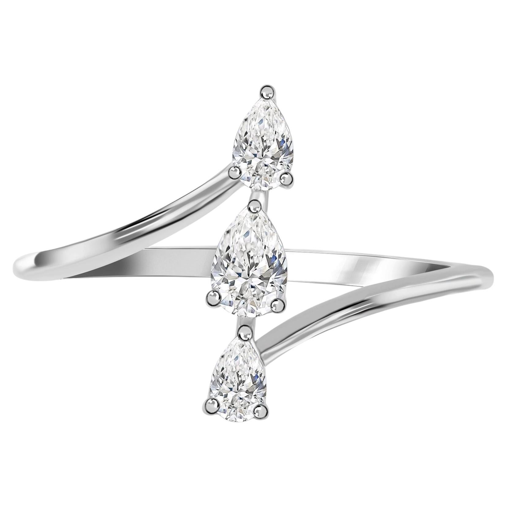 For Sale:  0.28 Carat Natural Pear Diamond Vertical Three Stone Ring 18K White Gold