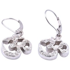 0.28 Carat Round Diamond 14 Karat White Gold Om Style Earrings