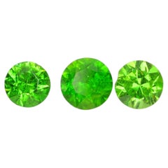 0.28 ct, demantoid garnet set