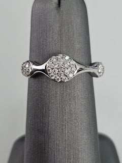 Used 0.28 cts White Diamond Cluster Ring